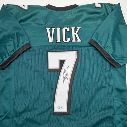 Autographed/Signed Michael Mike Vick Philadelphia Green Football Jersey Beckett BAS COA