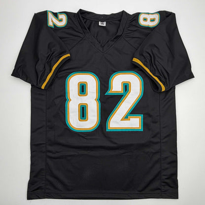 Autographed/Signed Jimmy Smith Jacksonville Black Football Jersey Beckett BAS COA