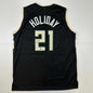 Autographed/Signed Jrue Holiday Milwaukee Black Basketball Jersey Beckett BAS COA