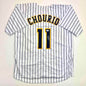 Autographed/Signed Jackson Chourio Milwaukee Pinstripe Baseball Jersey Beckett BAS COA