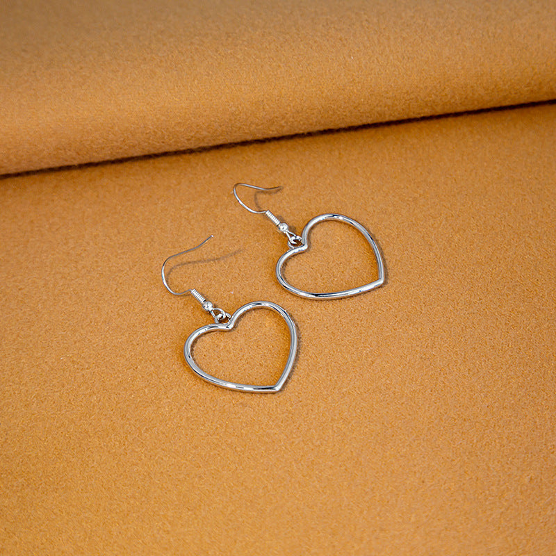 Hollow Peach Heart Stud Earrings