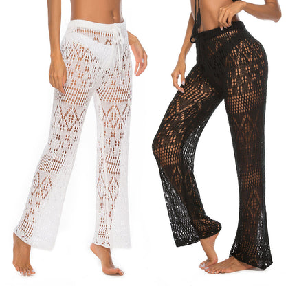 Solid color sexy ladies nightclub sexy see-through cut-out woven anti-hiccup trousers hooked beach pants