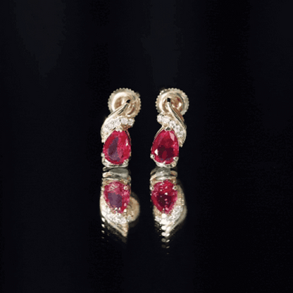 Lab Created Ruby Teardrop Stud Earrings with Diamond Accent