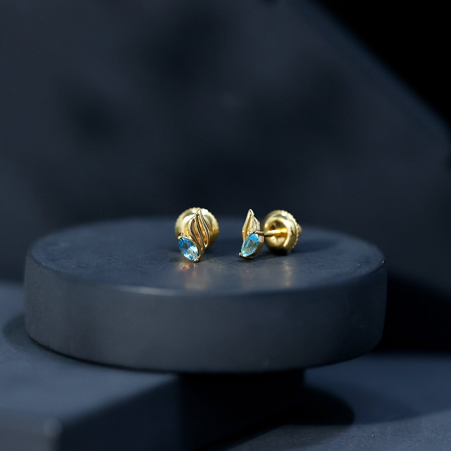 Natural Swiss Blue Topaz Leaf Earrings in Silver