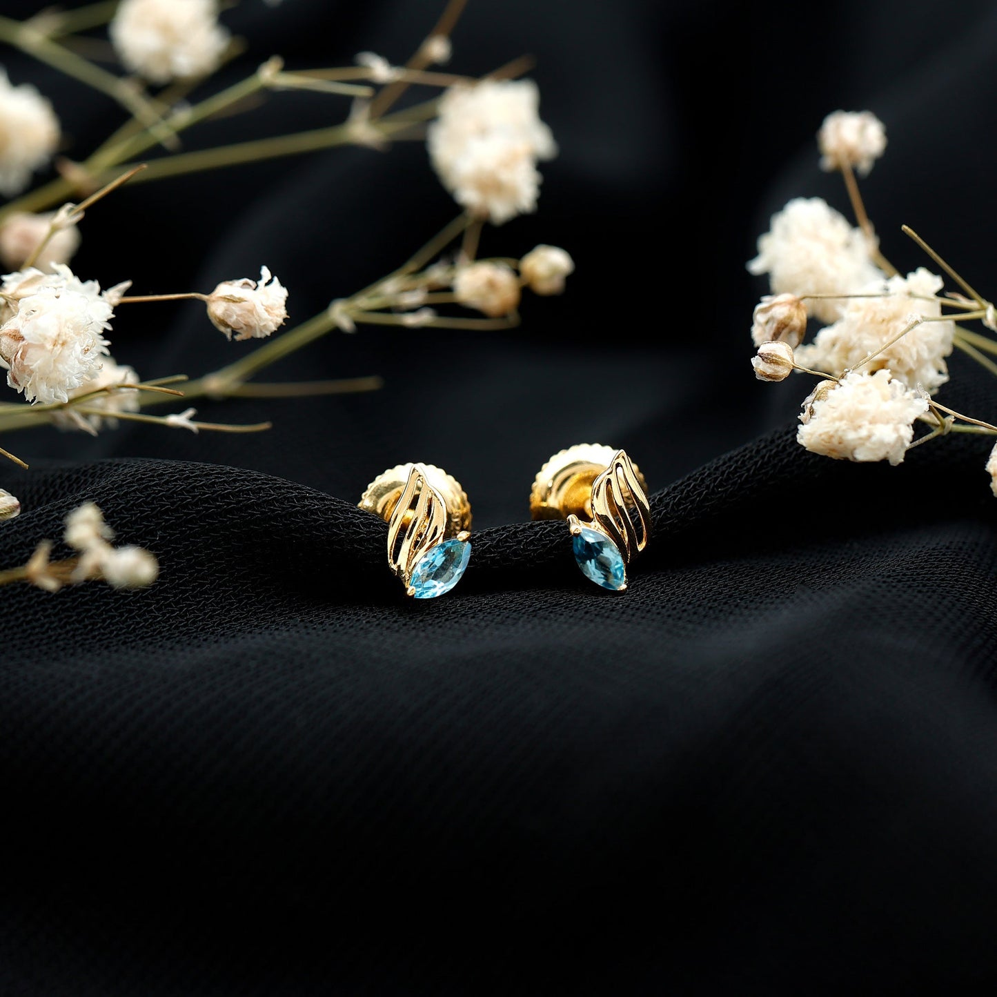 Natural Swiss Blue Topaz Leaf Earrings in Silver