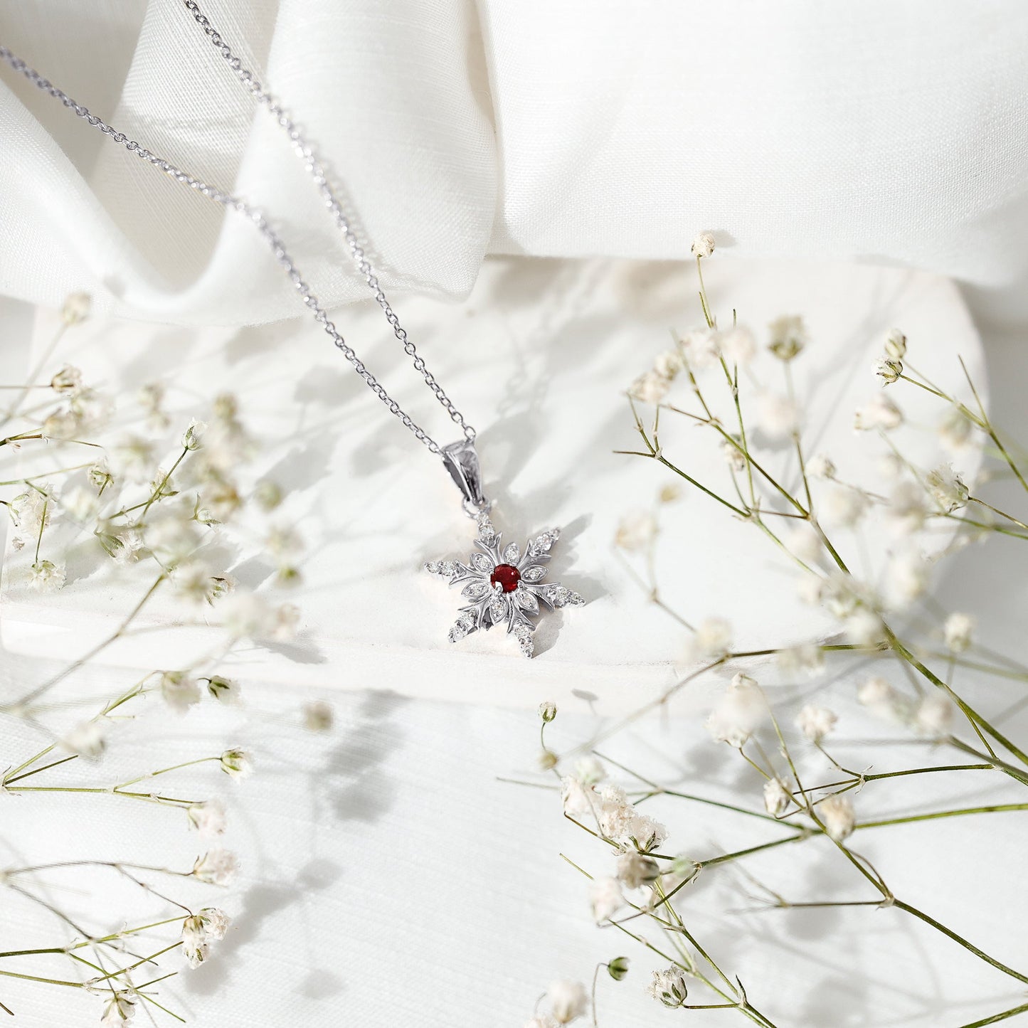 Lab Created Ruby Snowflake Pendant with Diamond Accent