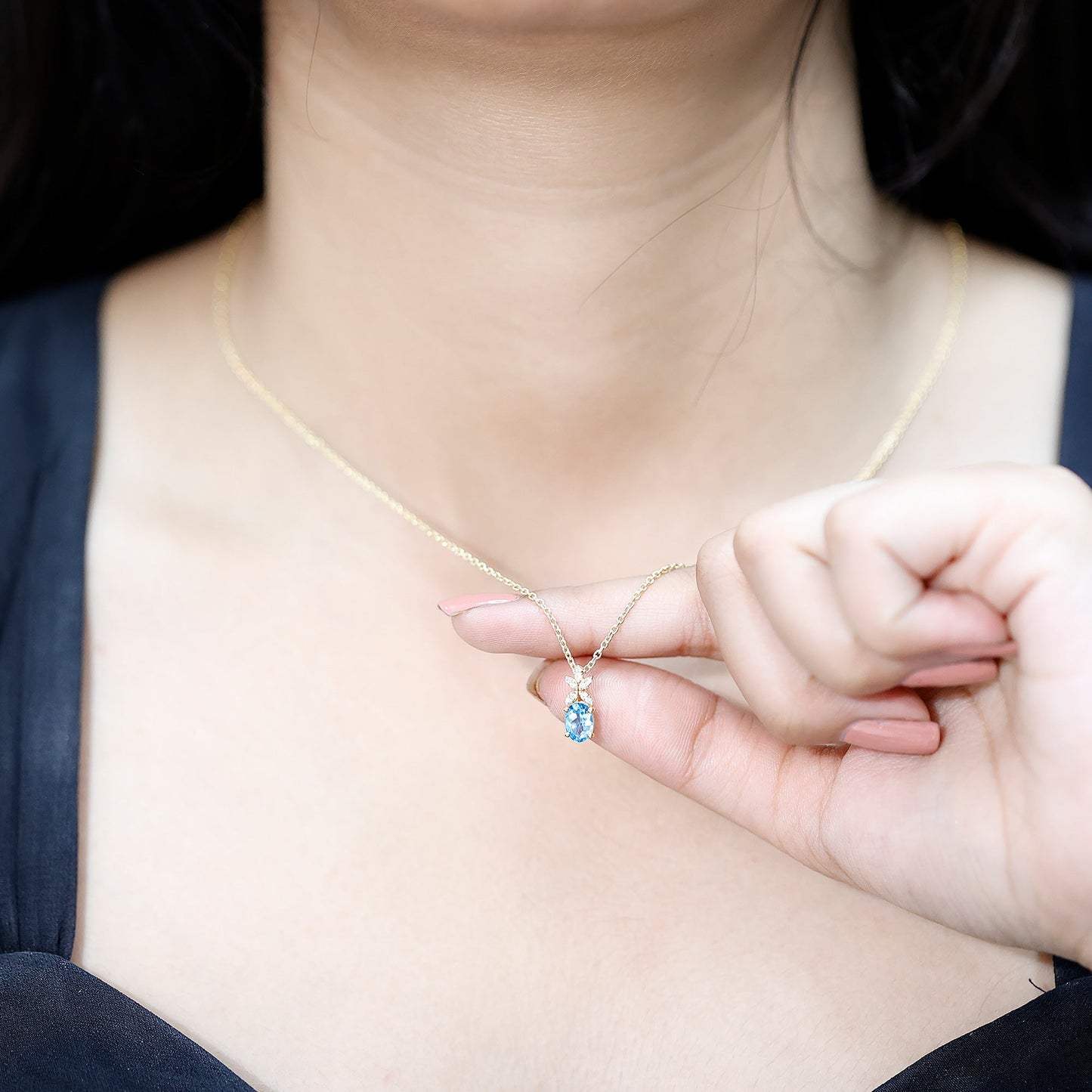 Oval Cut 0.65 Carat Swiss Blue Topaz and Diamond Flower Necklace with Chain