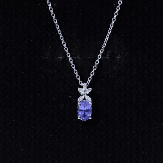 Oval Shaped 1 Carat Tanzanite Pendant Necklace with Diamond Flower