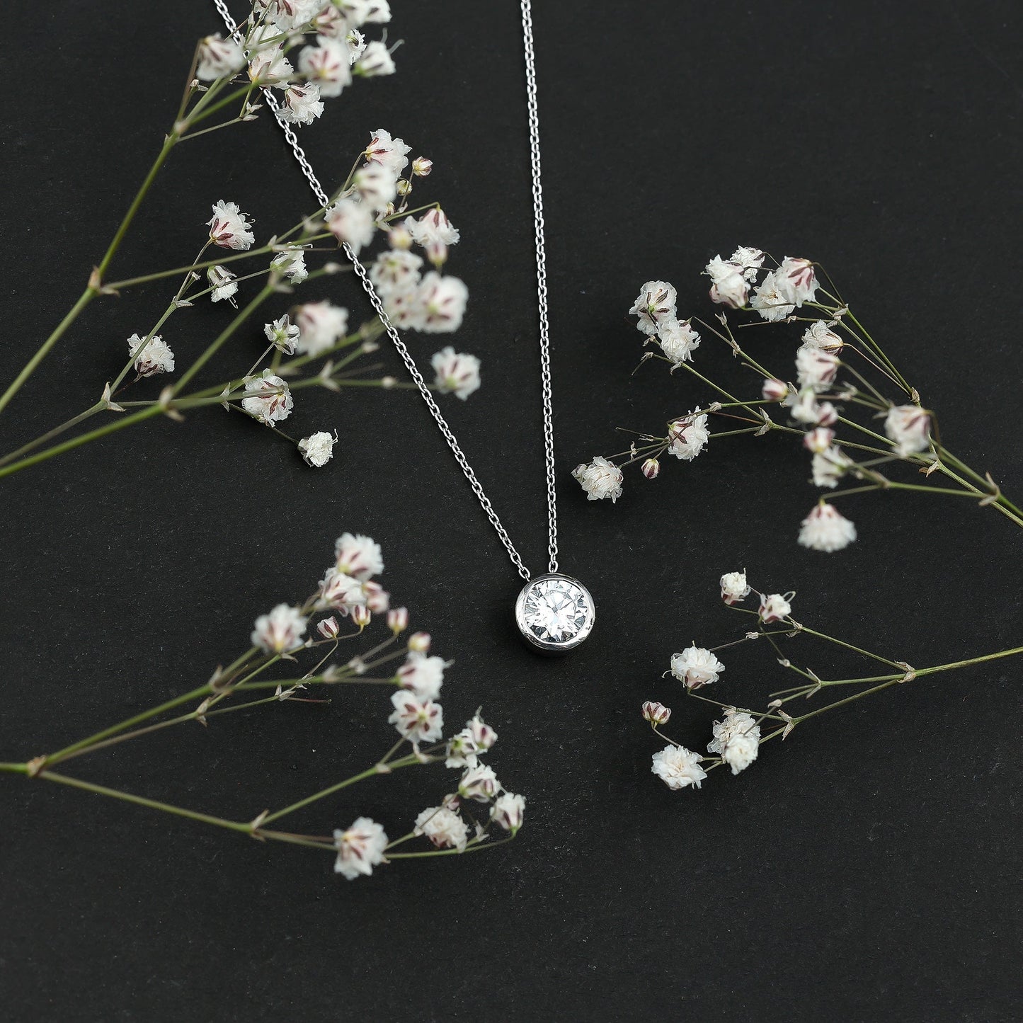 Bezel Set 1.36 Carat Round Moissanite Necklace in Silver