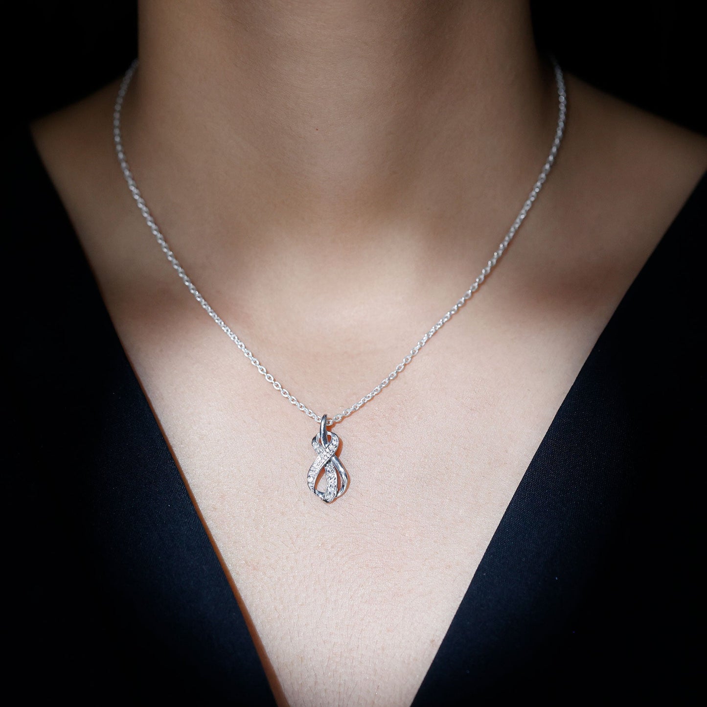 Pave Set Moissanite Infinity Knot Necklace with Silver Chain