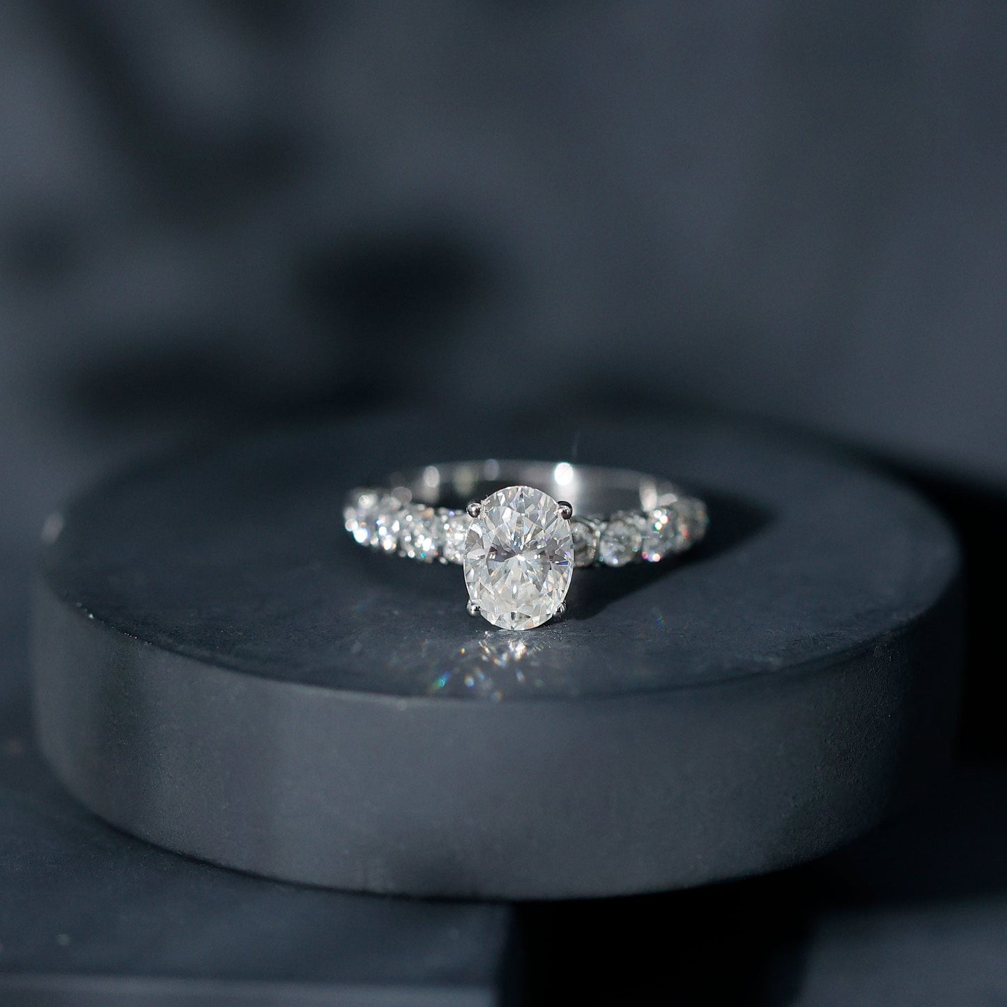 Oval Moissanite Solitaire Engagement Ring with Side Stones