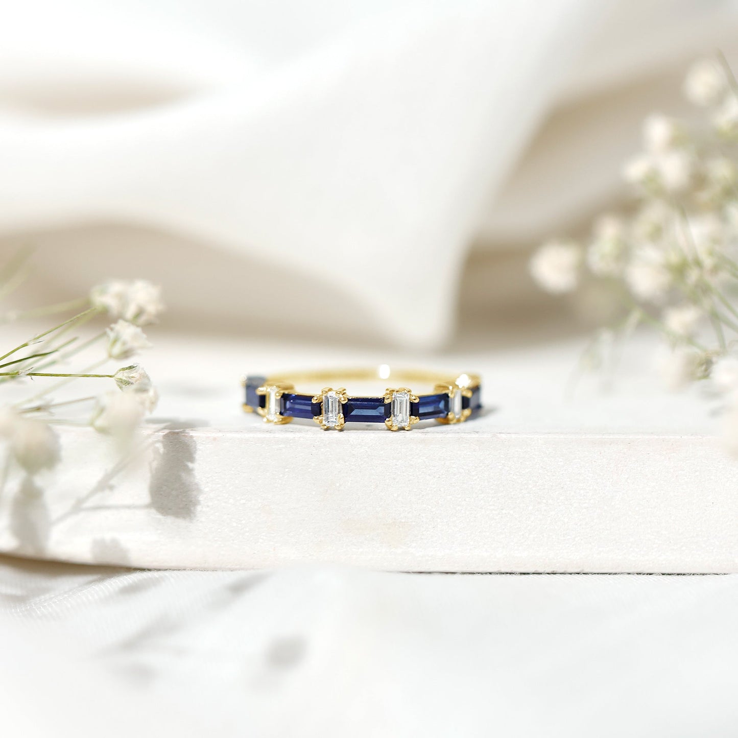 Blue Sapphire and Diamond Half Eternity Ring