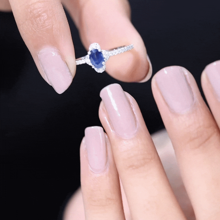 Natural 0.6 Carat Blue Sapphire Oval Engagement Ring with Diamond
