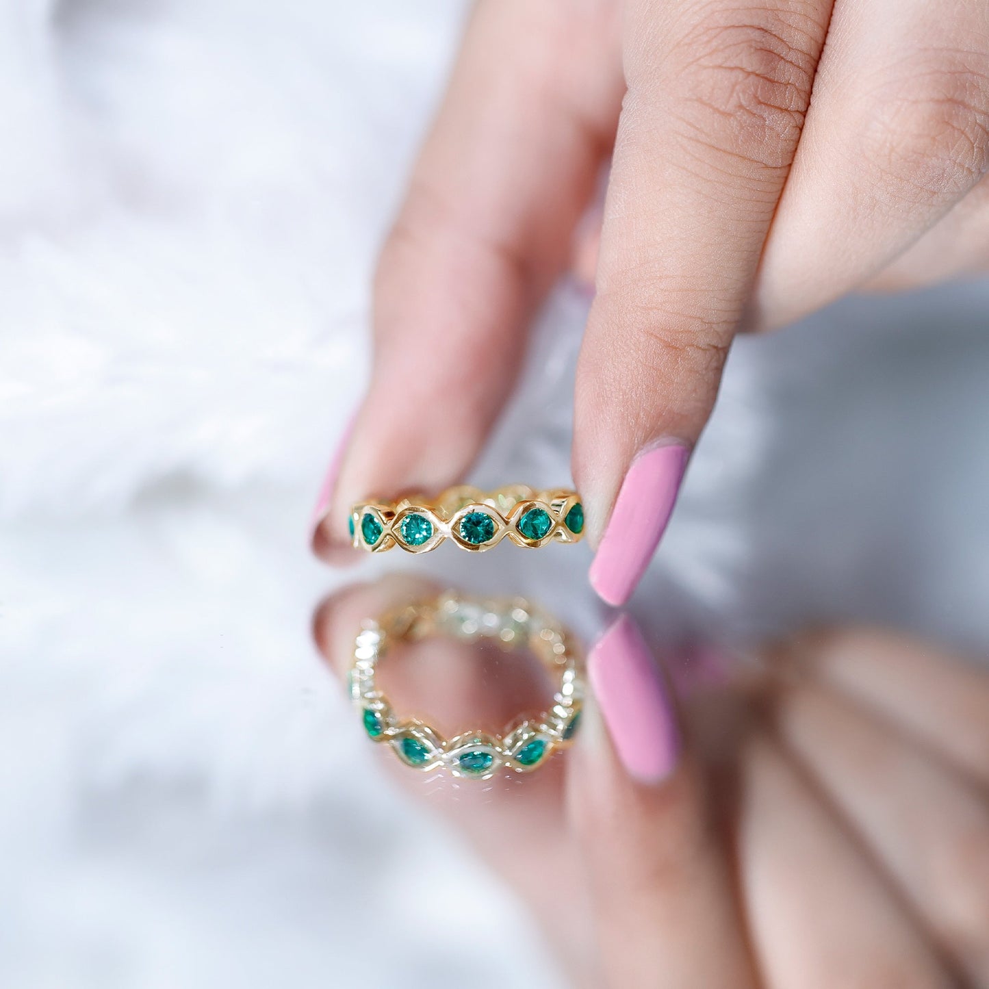 Certified Lab Grown Emerald Infinity Twisted Eternity Ring