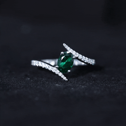 Oval Shaped 5X7 MM Lab Grown Emerald Bypass Engagement Ring
