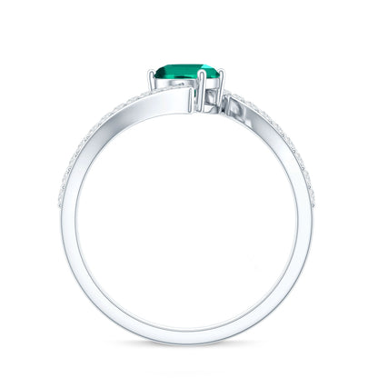 Oval Shaped 5X7 MM Lab Grown Emerald Bypass Engagement Ring