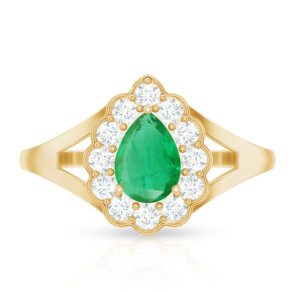 0.6 Carat Pear Cut Emerald Engagement Ring with Diamond Halo