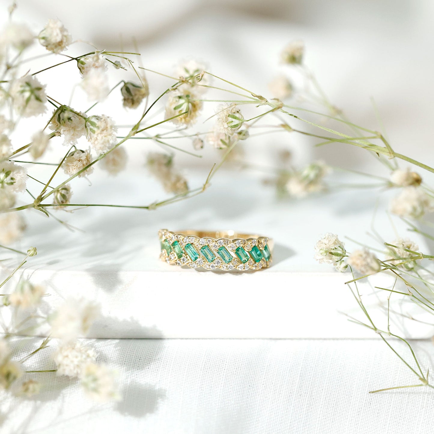 Baguette Emerald and Diamond Braided Half Eternity Band Ring