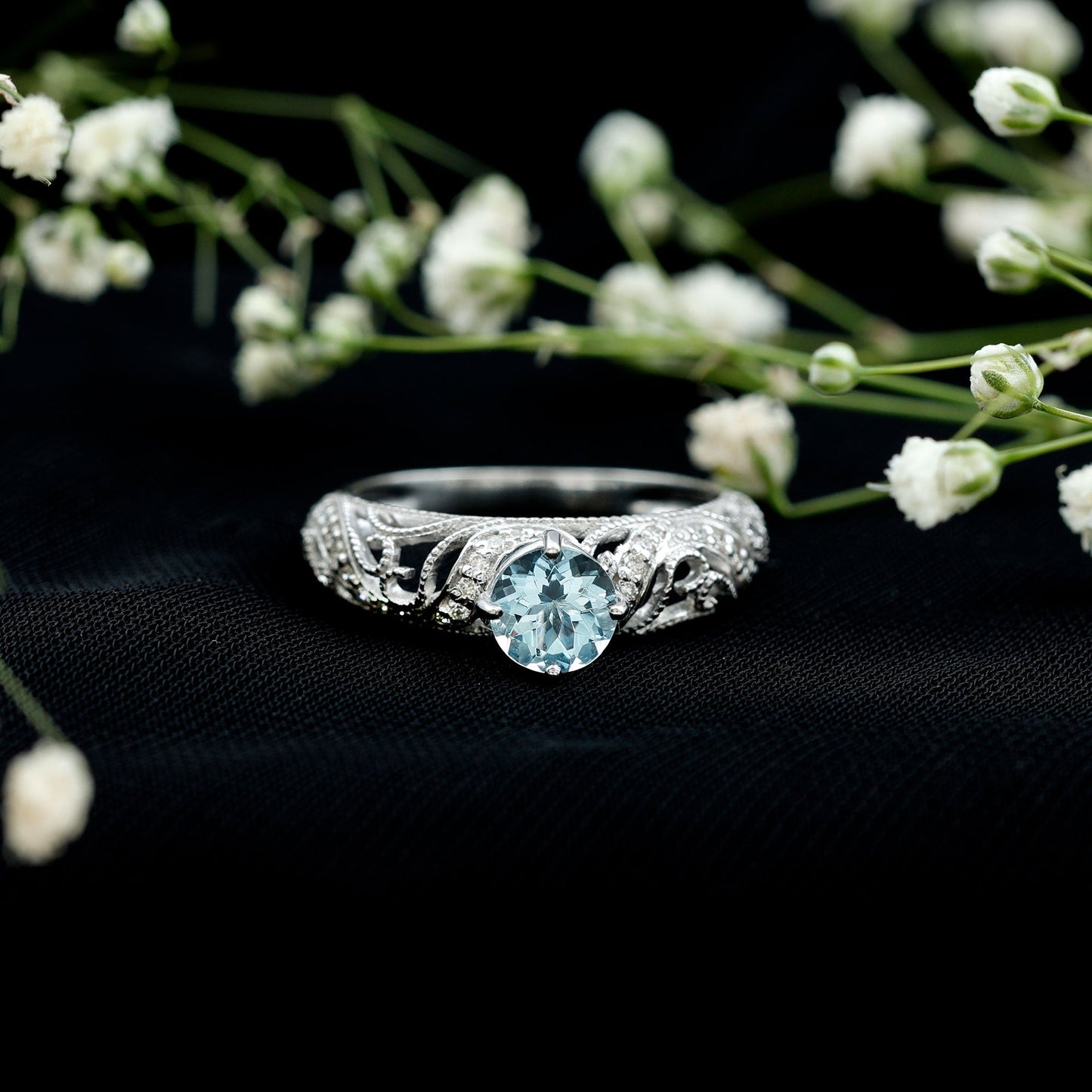 0.8 Carat Vintage Style Aquamarine and Diamond Engagement Ring