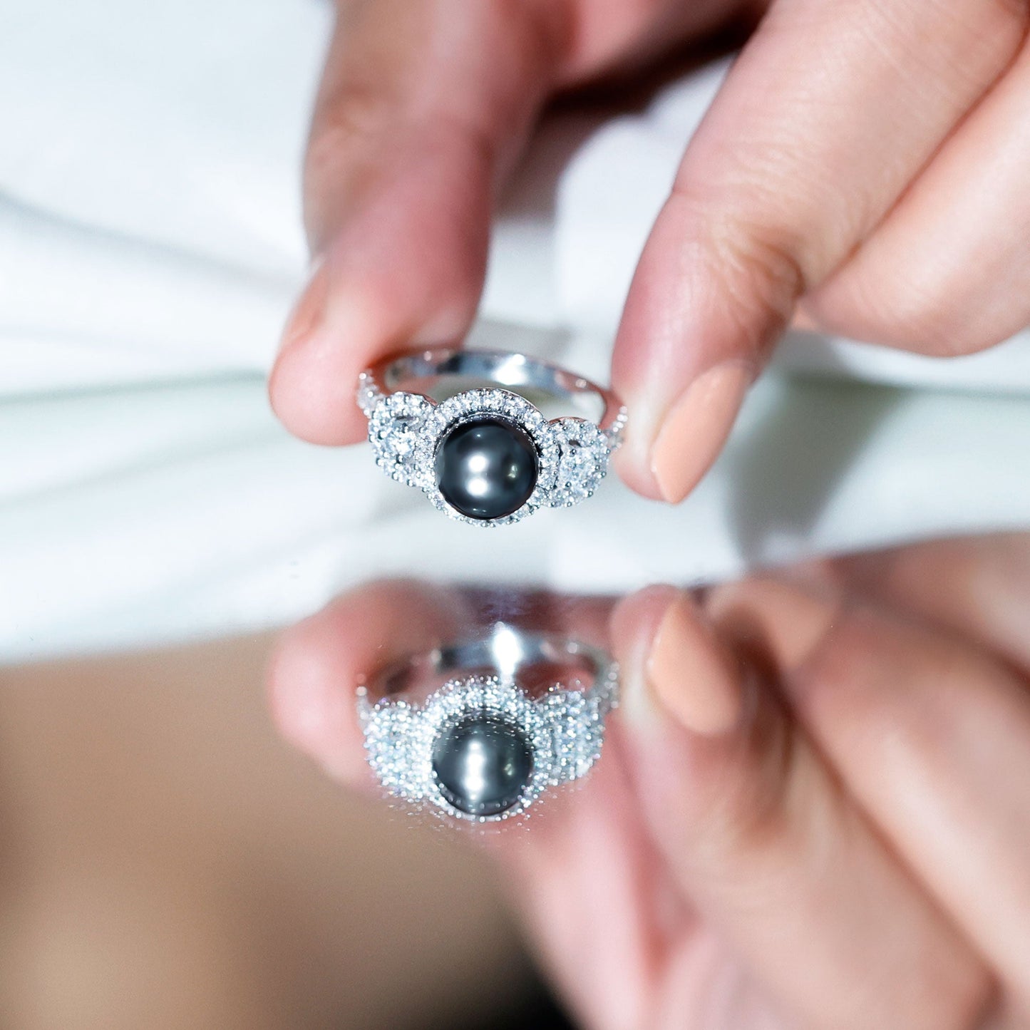 7.5 Carat Round Black Pearl Engagement Ring with Moissanite Accent