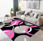 This Is a Large Area Rug with a Black Base Featuring a Geometric Pink Oval Texture Made of Golden Diamond Carpets