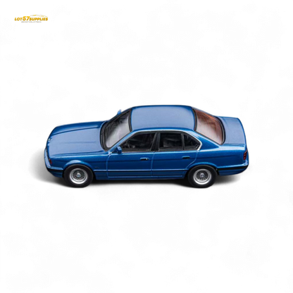 DCM BMW E34 5-Series Sedan Avis Metallic Blue 1:64