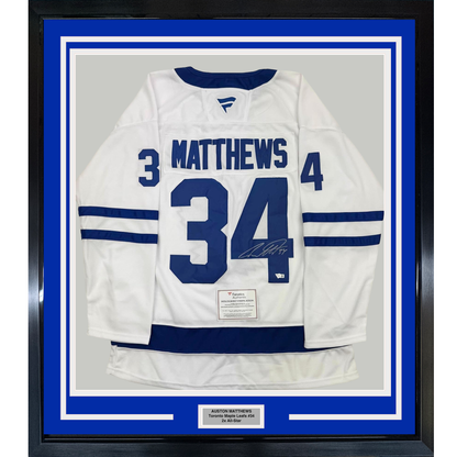 Framed Autographed/Signed Auston Matthews 35x39 Toronto Maple Leafs White Hockey Jersey Fanatics COA