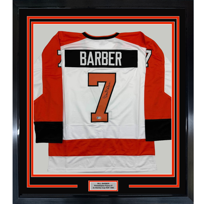 Framed Autographed/Signed Bill Barber 35x39 Philadelphia White Hockey Jersey Beckett BAS COA