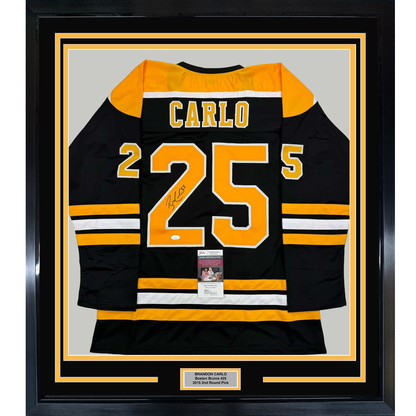 Framed Autographed/Signed Brandon Carlo 35x39 Boston Black Hockey Jersey JSA COA