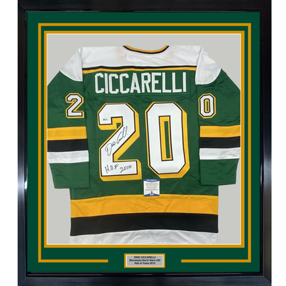 Framed Autographed/Signed Dino Ciccarelli 35x39 HOF 2010 Minnesota Green Hockey Jersey Beckett BAS COA