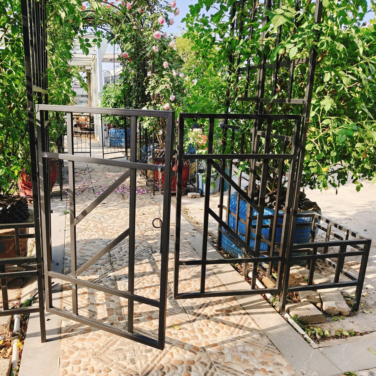 Metal Garden Arch with Gate and Planter for Climbing Plants