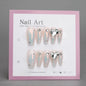 Classic White Acrylic Nails with Designs