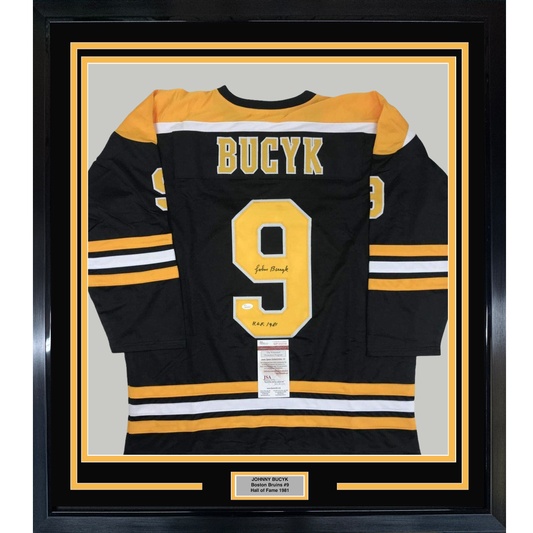 Framed Autographed/Signed John Johnny Bucyk HOF 1981 35x39 Boston Black Hockey Jersey JSA COA