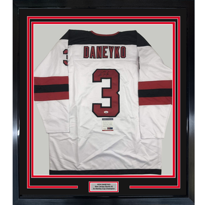 Framed Autographed/Signed Ken Daneyko 35x39 New Jersey White Hockey Jersey PSA/DNA COA
