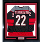 Framed Autographed/Signed Logan Stankoven 35x39 Carolina Black Hockey Jersey Beckett BAS COA
