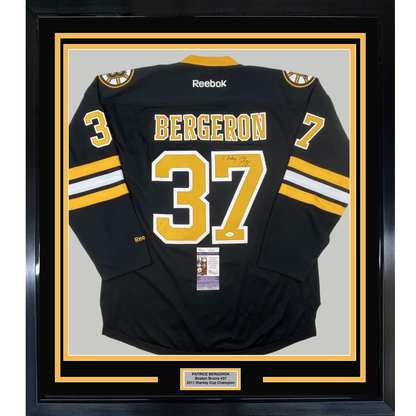 Framed Autographed/Signed Patrice 35x39 Bergeron Personalized To Anthony Boston Bruins Black Hockey Jersey JSA COA
