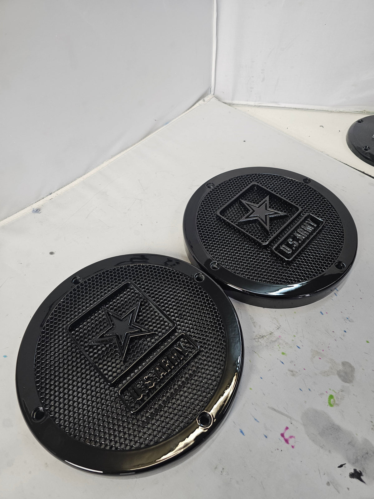 A set of Army speakers grill covers