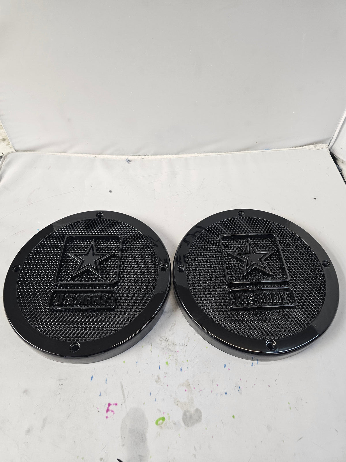 A set of Army speakers grill covers