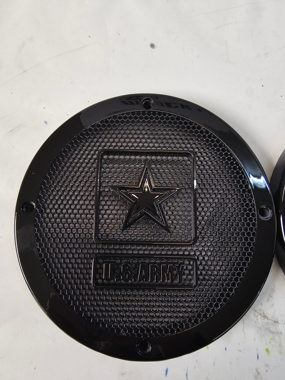 A set of Army speakers grill covers