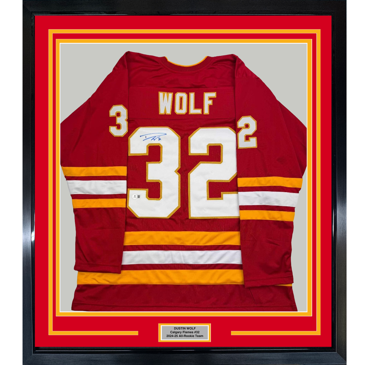 Framed Autographed/Signed Dustin Wolf 35x39 Calgary Red Hockey Jersey Beckett BAS COA